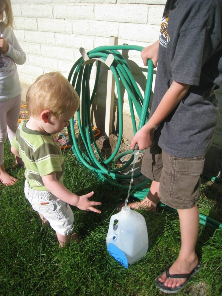 homemade watering can from milk jug for kids