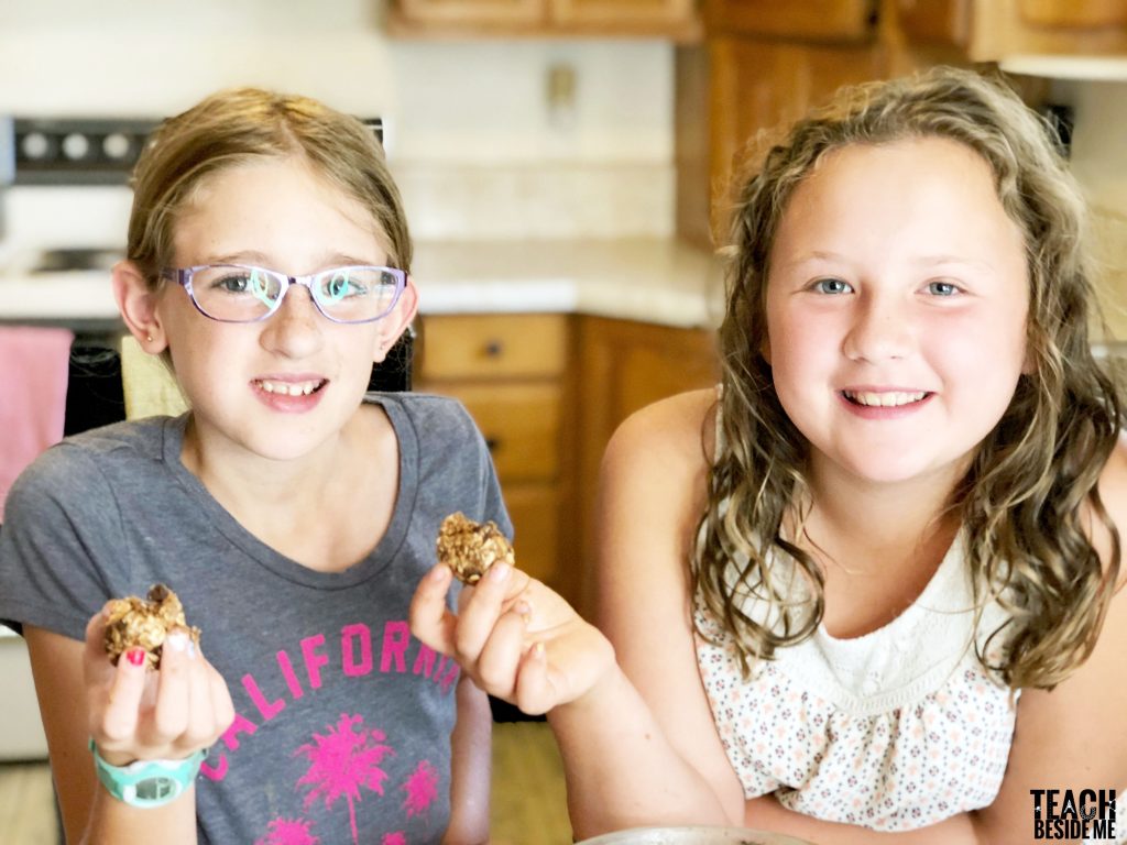kids in the kitchen making peanut butter balls
