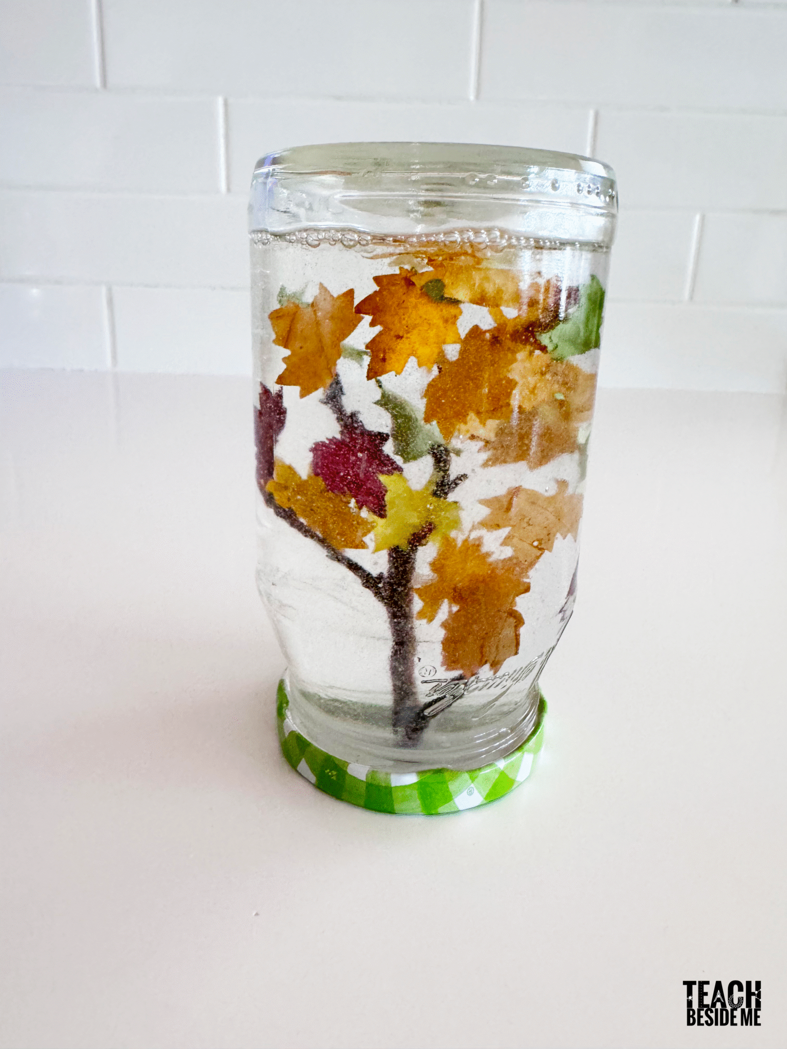 How to Make an Autumn Leaf Snow Globe - Teach Beside Me