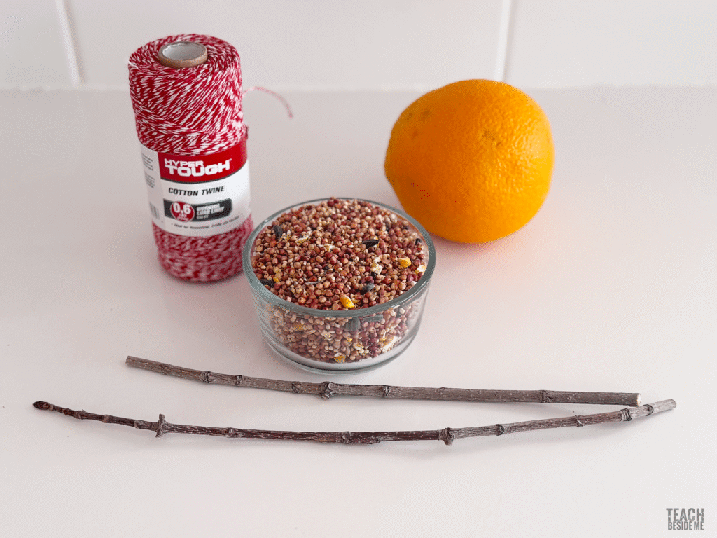 supplies to make an orange bird feeder
