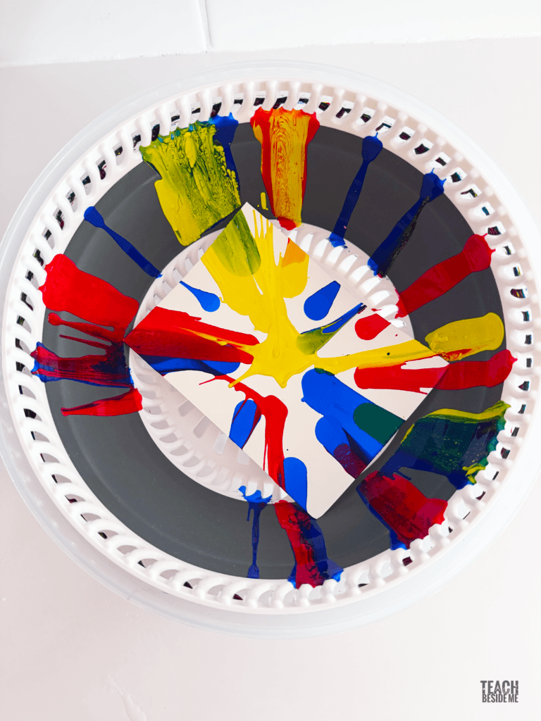 spin art painting in salad spinner